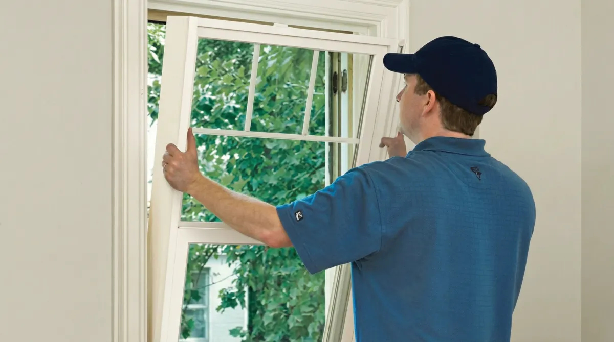 Professional contractors performing a residential window insulation and replacement service in Henderson, NV